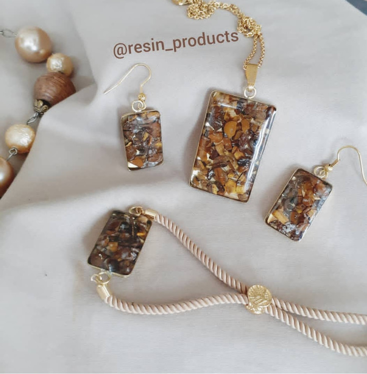 ست کامل زیورالات رزینی با سنگ چشم ببر